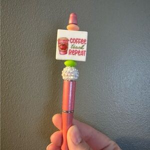 Pink Beaded Pen says Coffee Teach Repeat